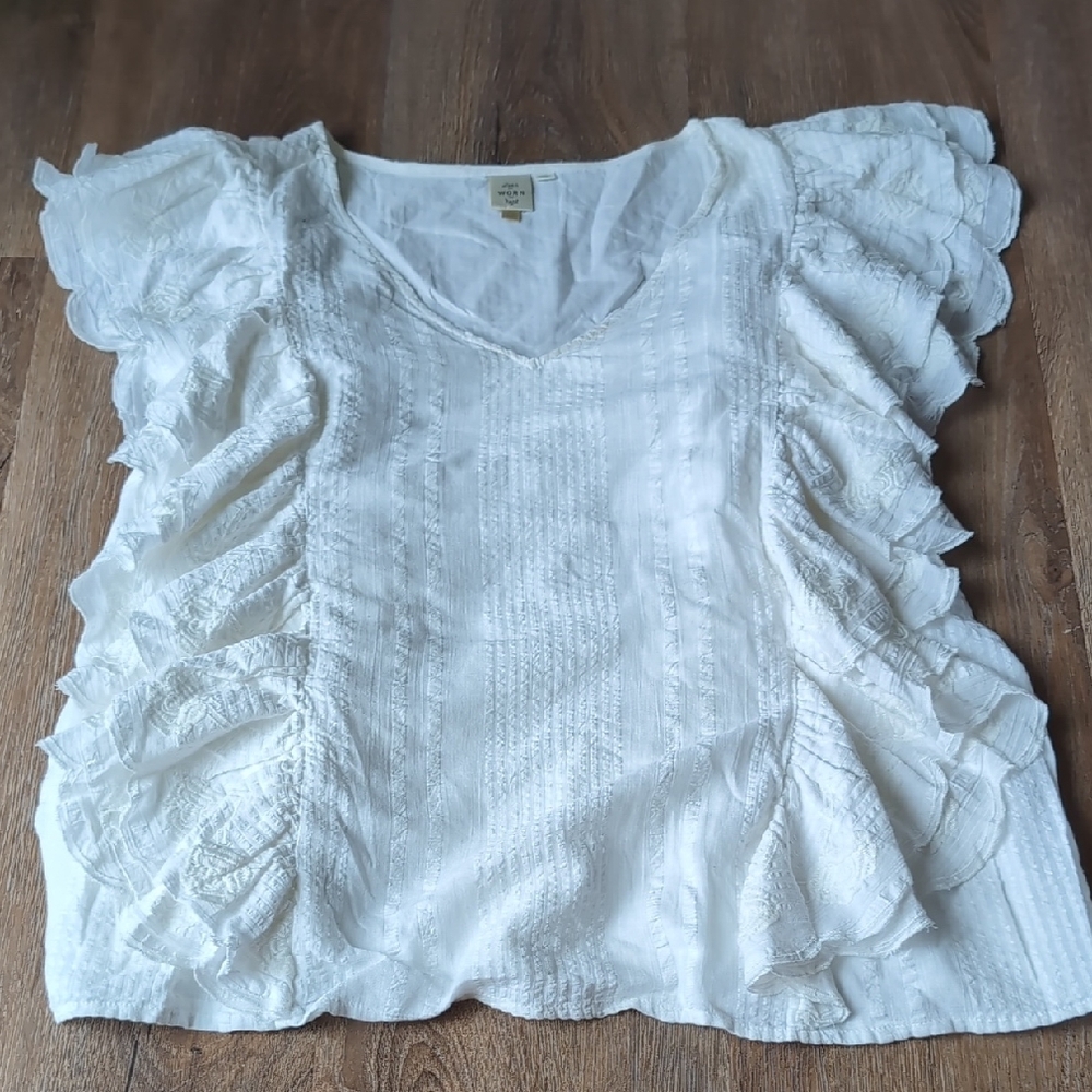White Ruffled Sleeveless Blouse